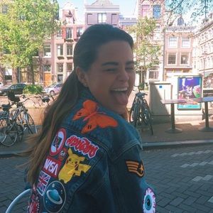 Custom funky one of a kind patches all over jean jacket